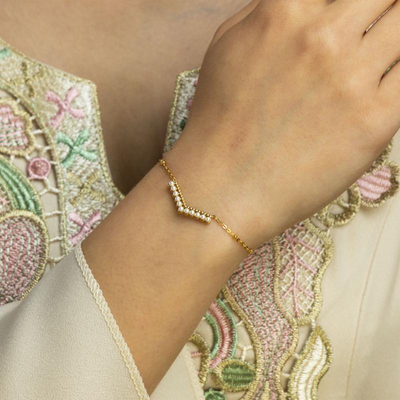 Mini - Curved row of sm pearls