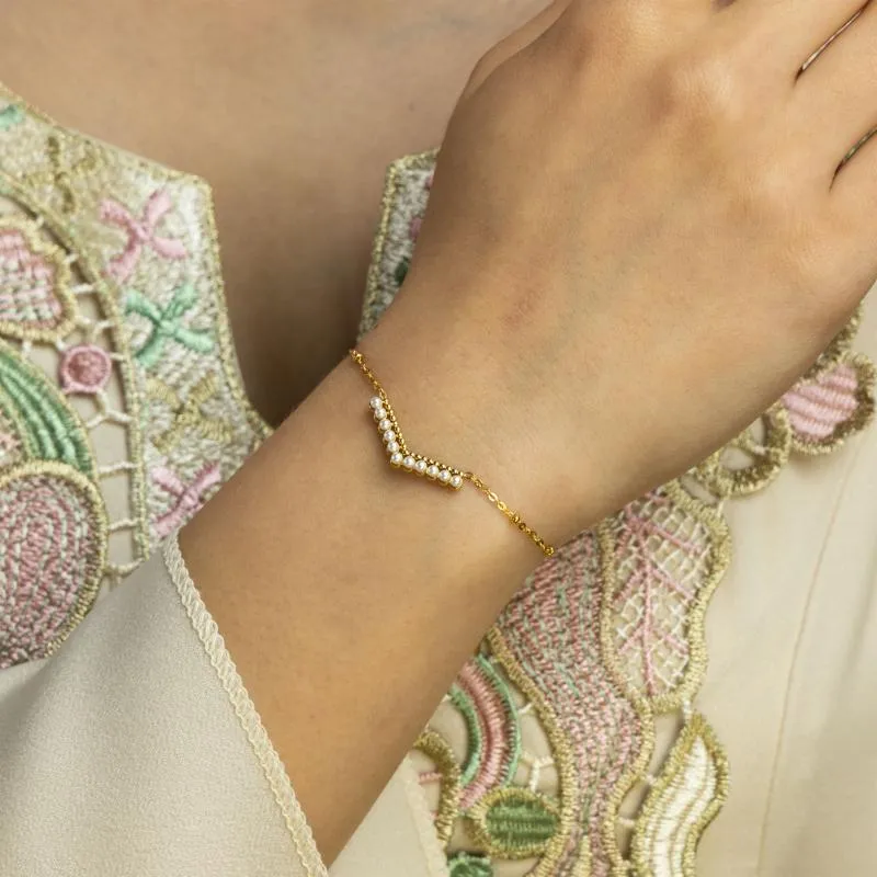 Mini - Curved row of sm pearls
